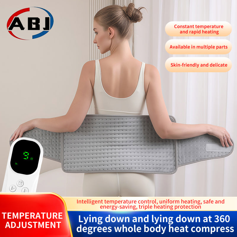 Woman wearing electric waist heat therapy belt