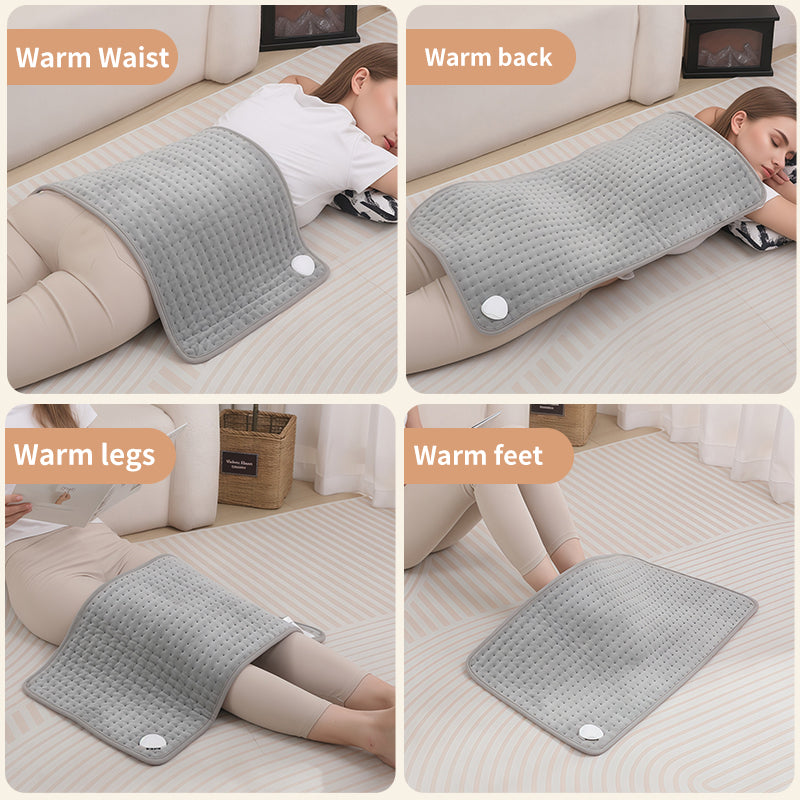 Woman using electric heating pad for back pain relief
